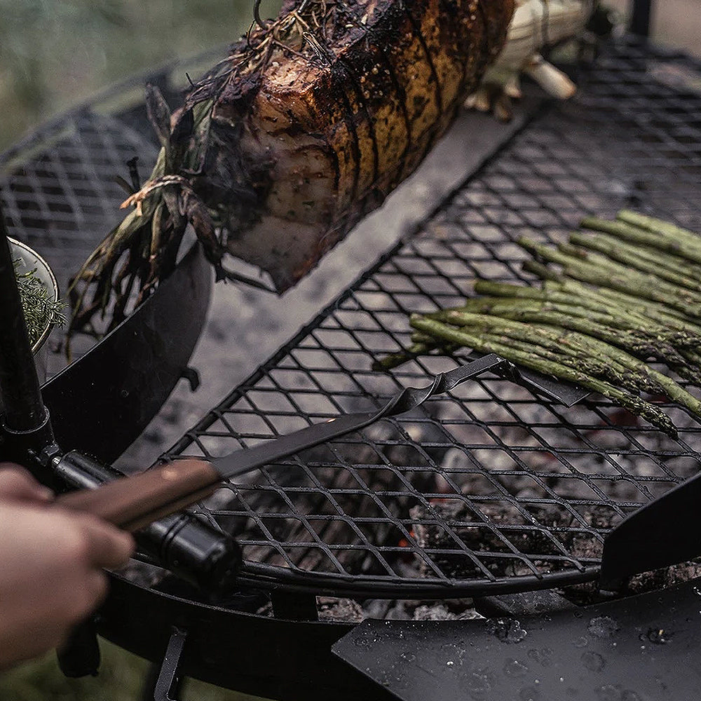 Cooking with Barebones Cowboy Grill Spatula in the Outdoor